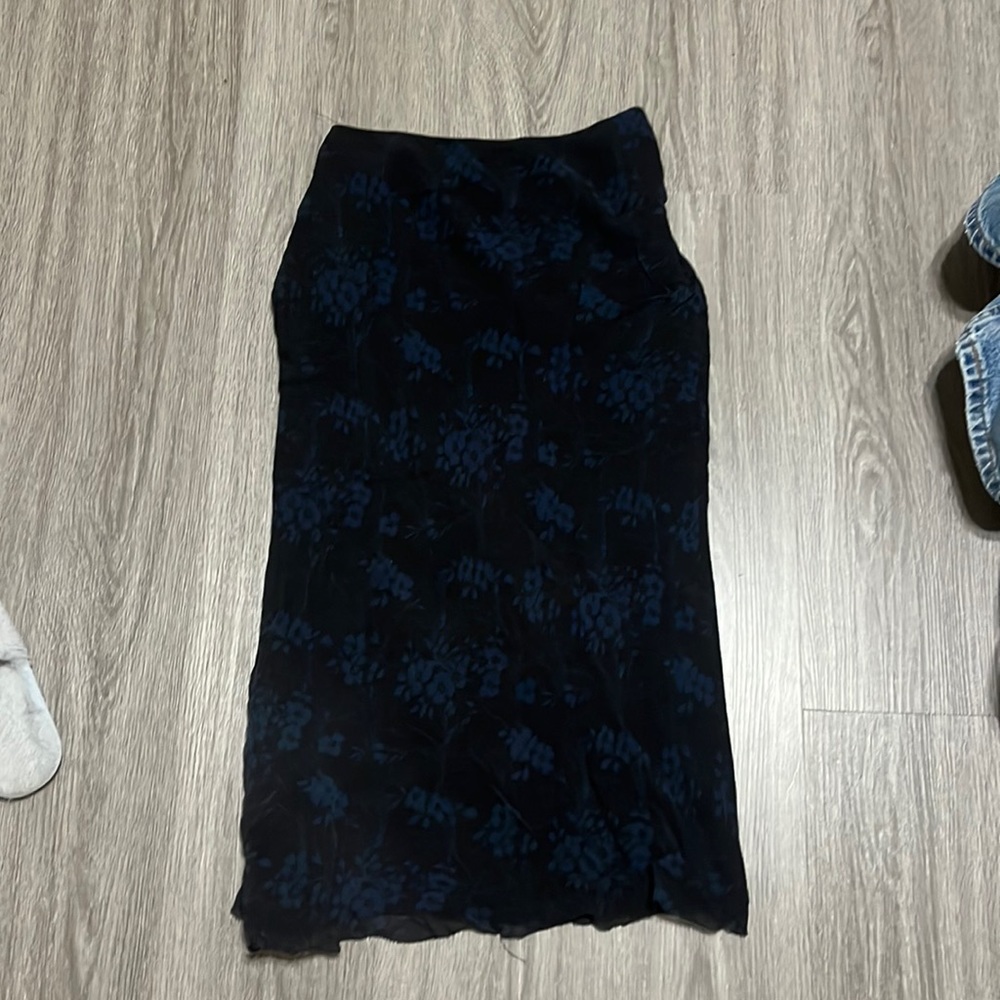 long black skirt with blue flowers